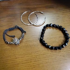 Two bracelets and a pair of hoops